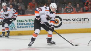 Bump Scores, Phantoms Fall in OT